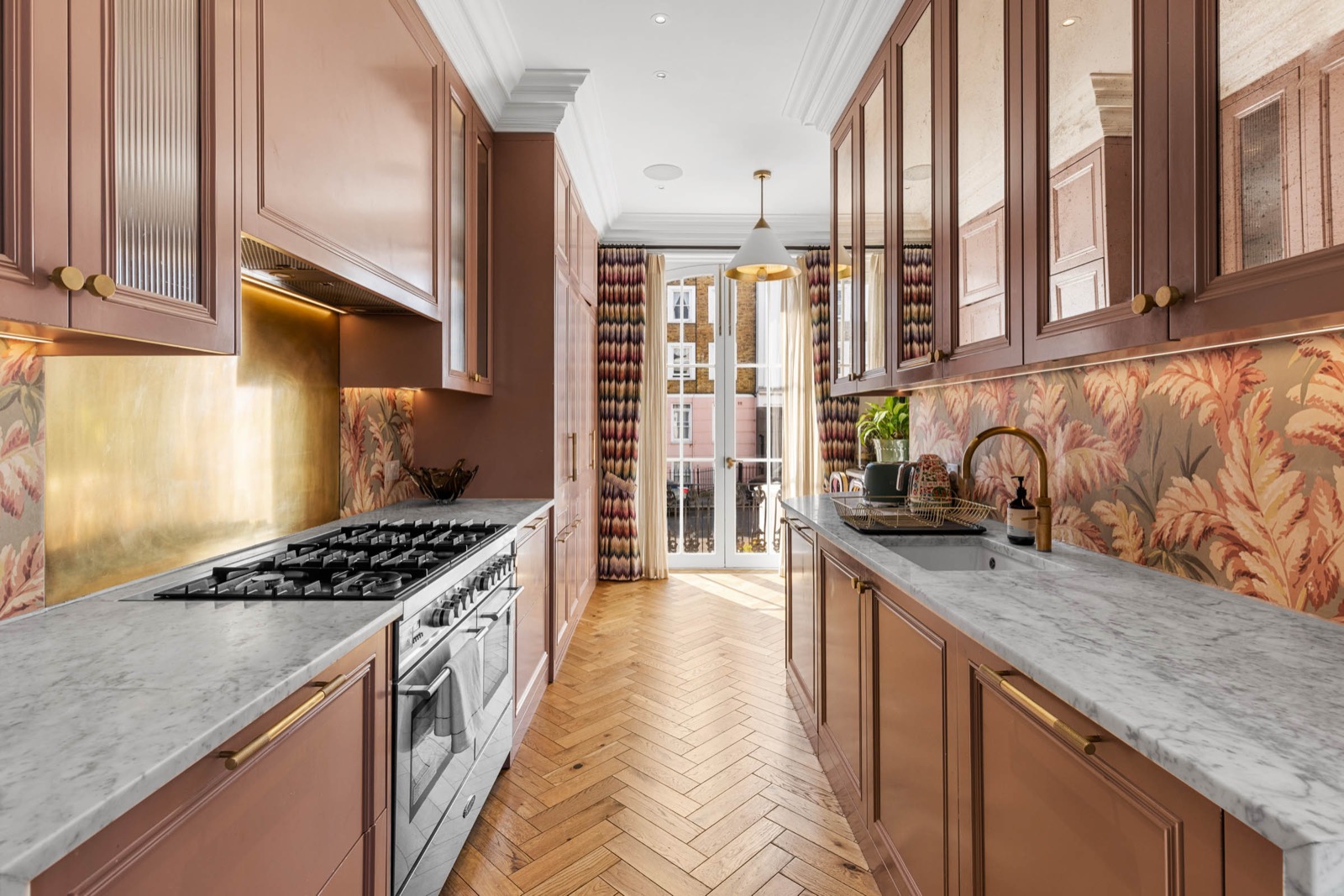 Exterior property photography of red-brick mansion houses on a leafy Hampstead street